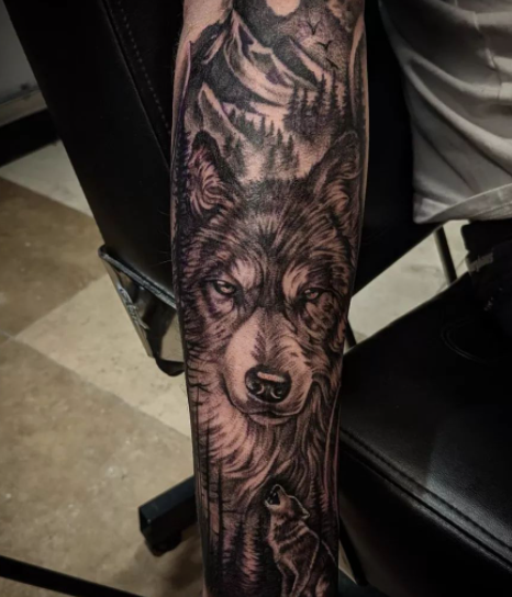 Realistic Black & Gray Wolf Tattoo On Forearm