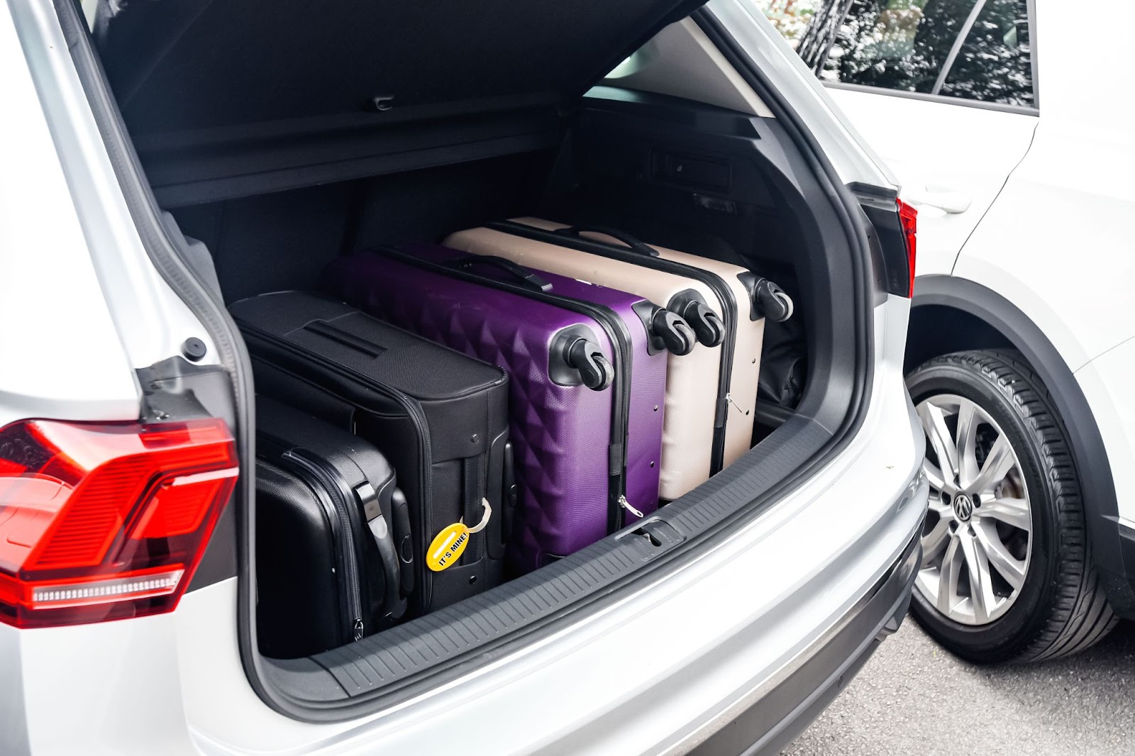 Car packed with luggage, road trip, travel, vacation, maintenance