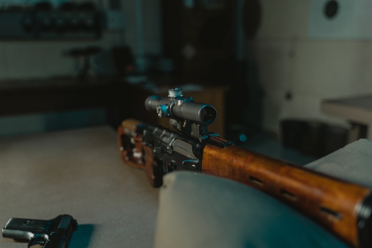 rifle with a thermal scope attachment