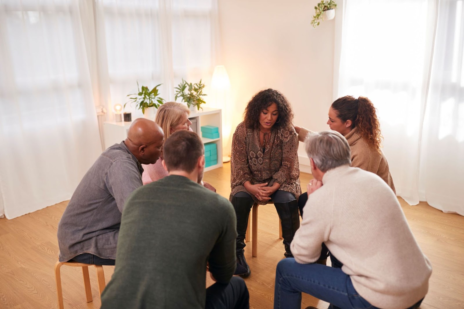support-group-consoling-woman