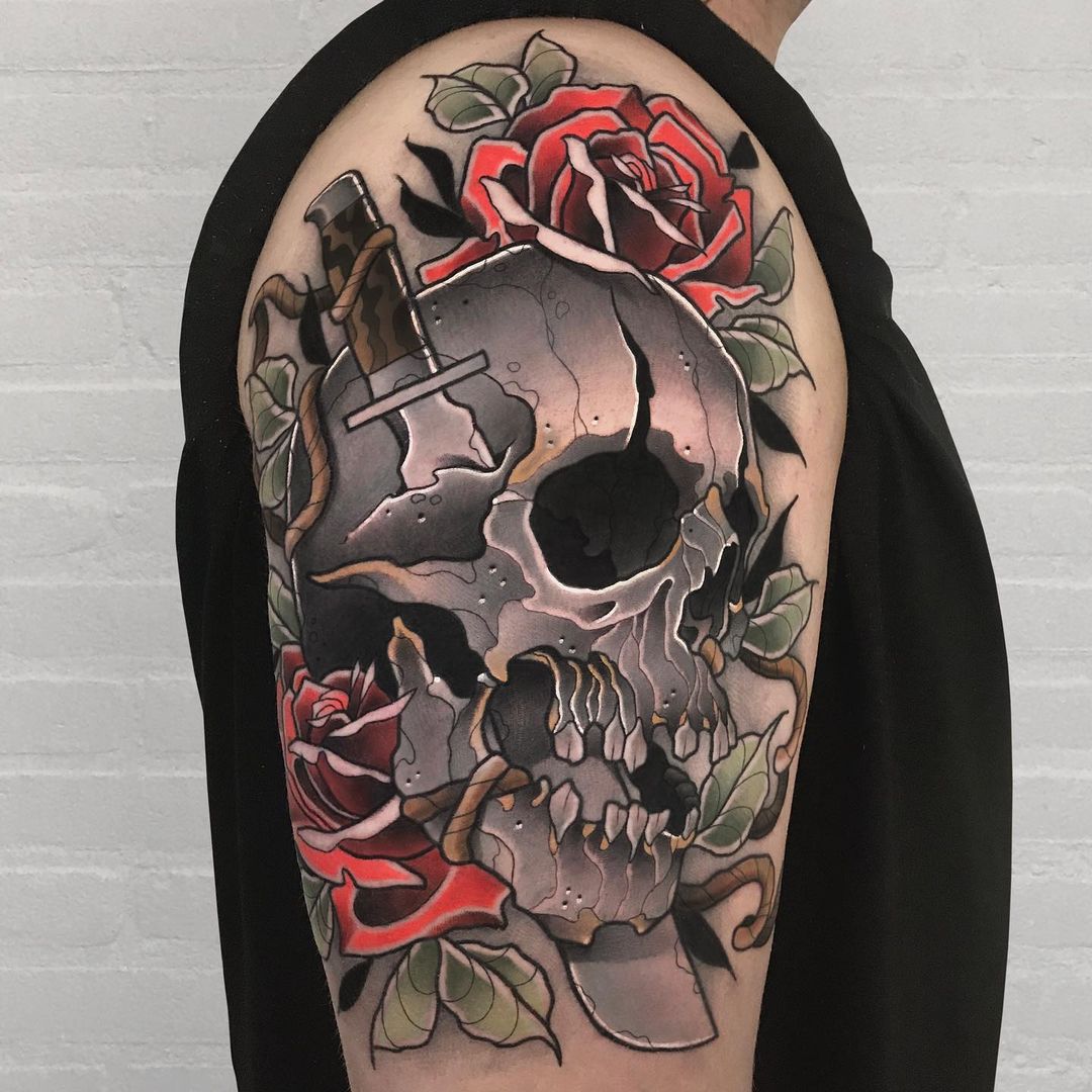 Pierced Skull With Roses Tattoo