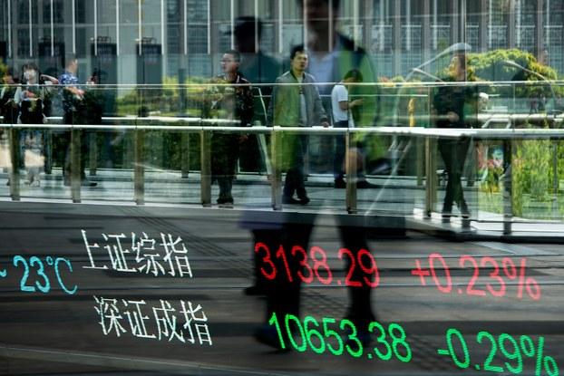 2019年6月24日,中国官方公开支持公务员投资证券市场。(资料图/美联社)