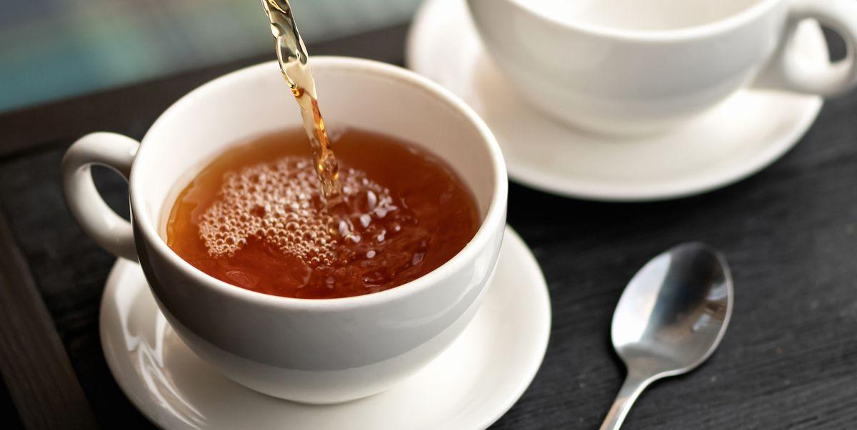 https://hips.hearstapps.com/hmg-prod/images/aromatic-hot-black-tea-pouring-into-white-cups-from-royalty-free-image-1661969718.jpg?crop=1.00xw:0.502xh;0,0.383xh&resize=1200:*