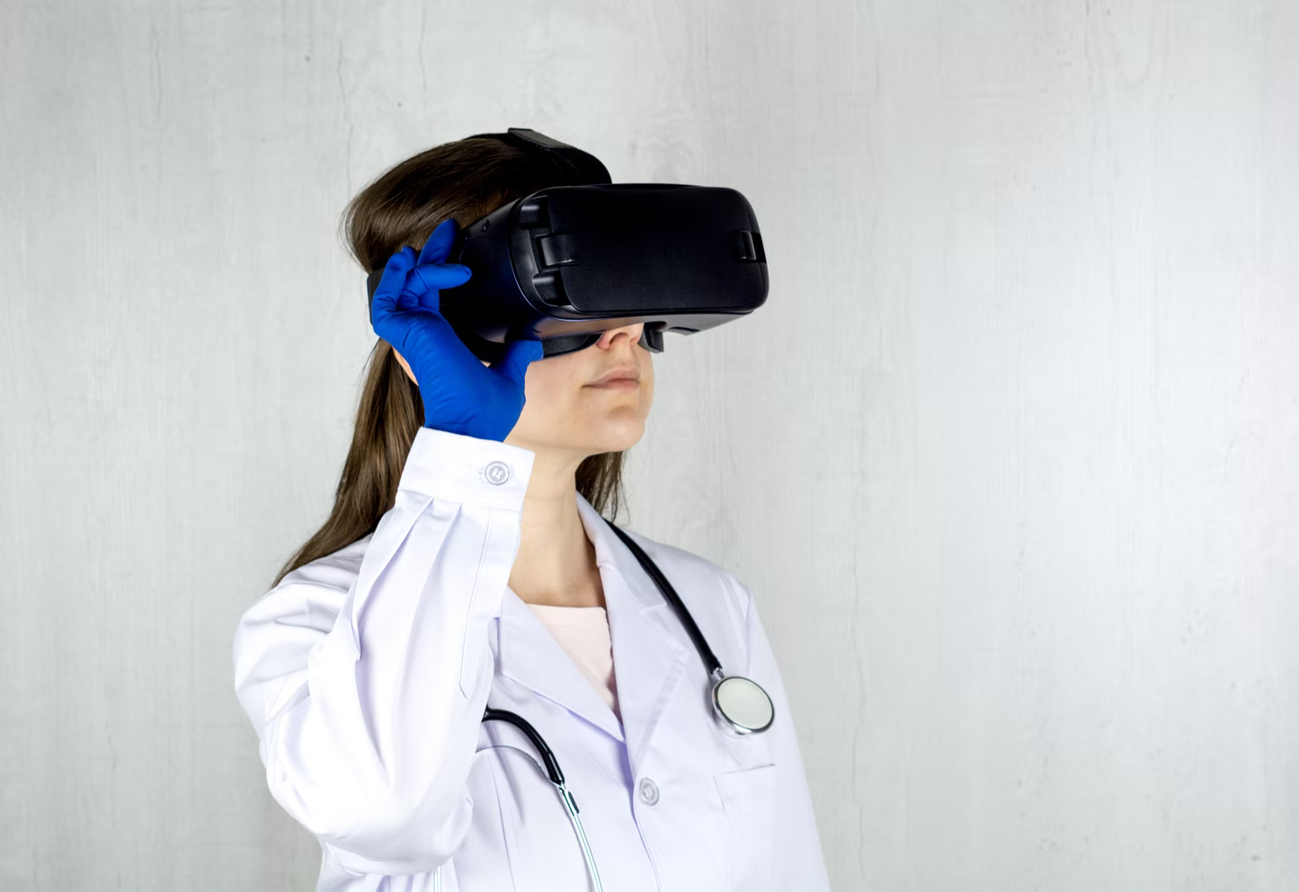A doctor wearing a VR headset