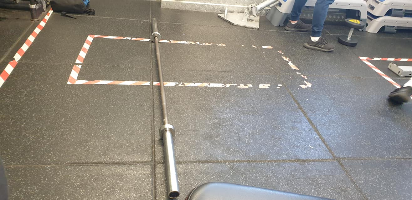olympic barbell on the gym floor