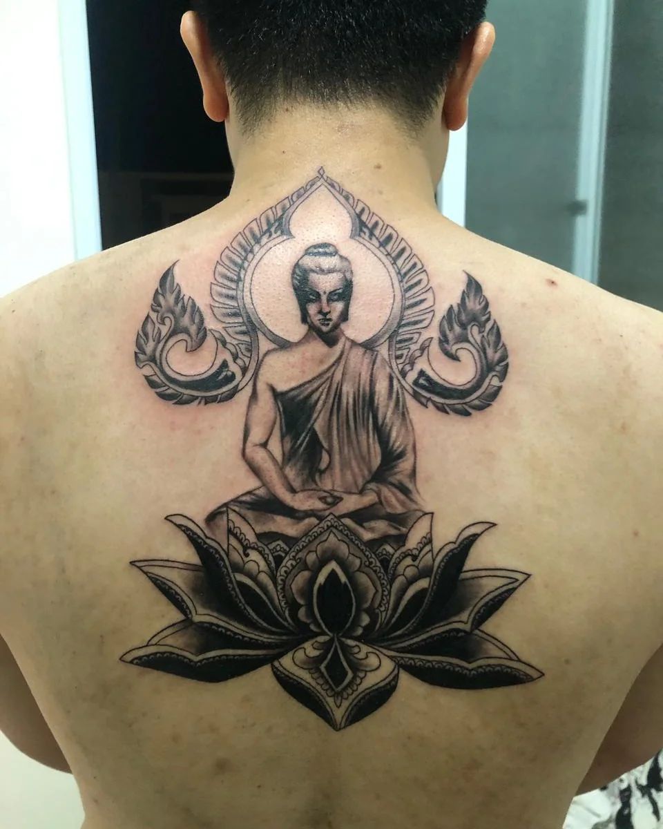 Buddha Sitting On Lotus Tattoo