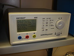 Adjustable switched-power supply for laboratory use