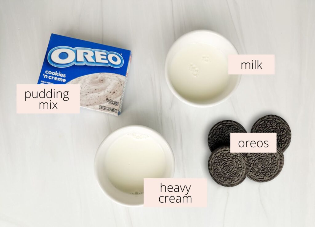 Ingredients for cookies and cream ninja creami ice cream arranged on a countertop.