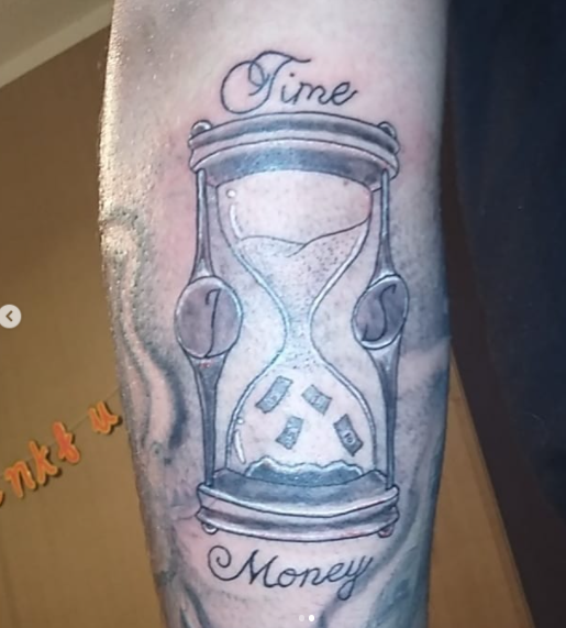 Hourglass With Wording Money Tattoo Design