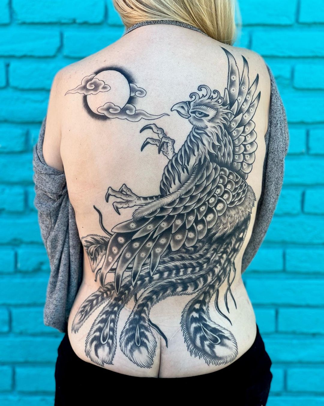 Phoenix With Sun And Clouds Tattoo