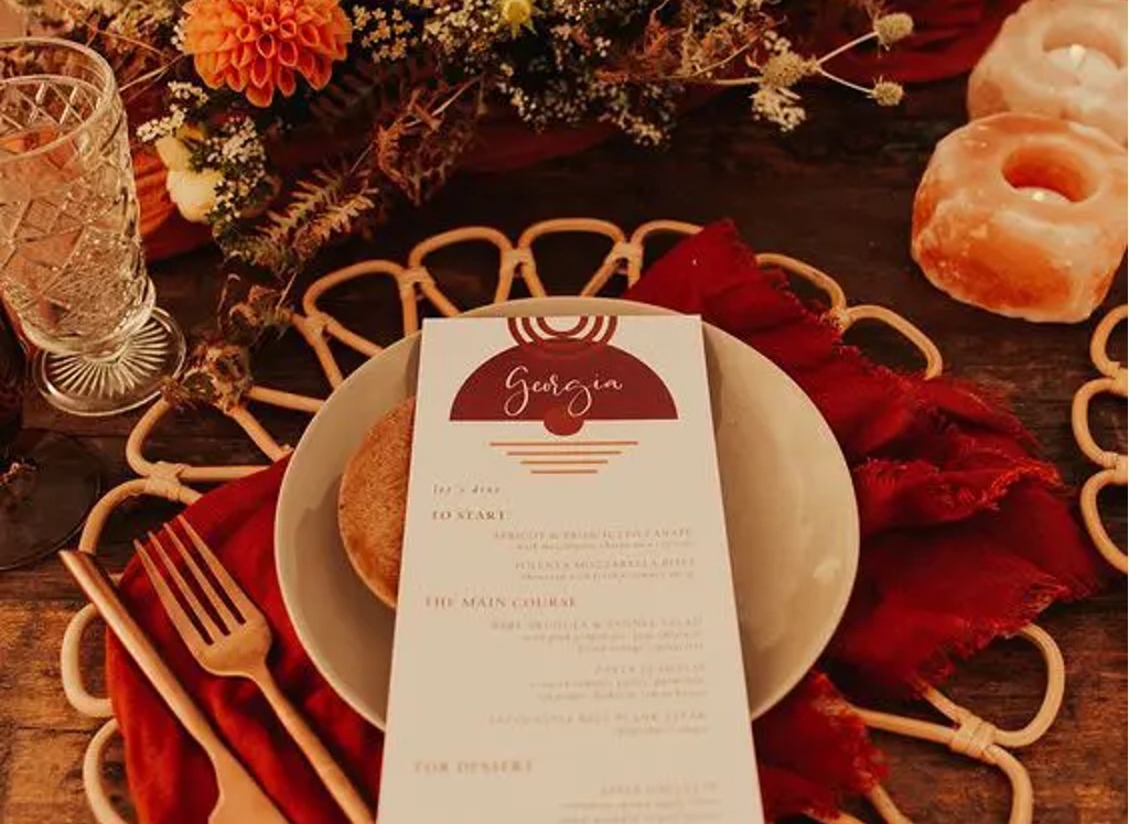 photo of moody wedding table with menu 