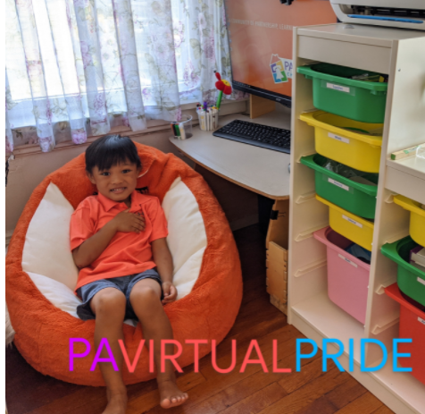 young smiling student sitting on a beanbag