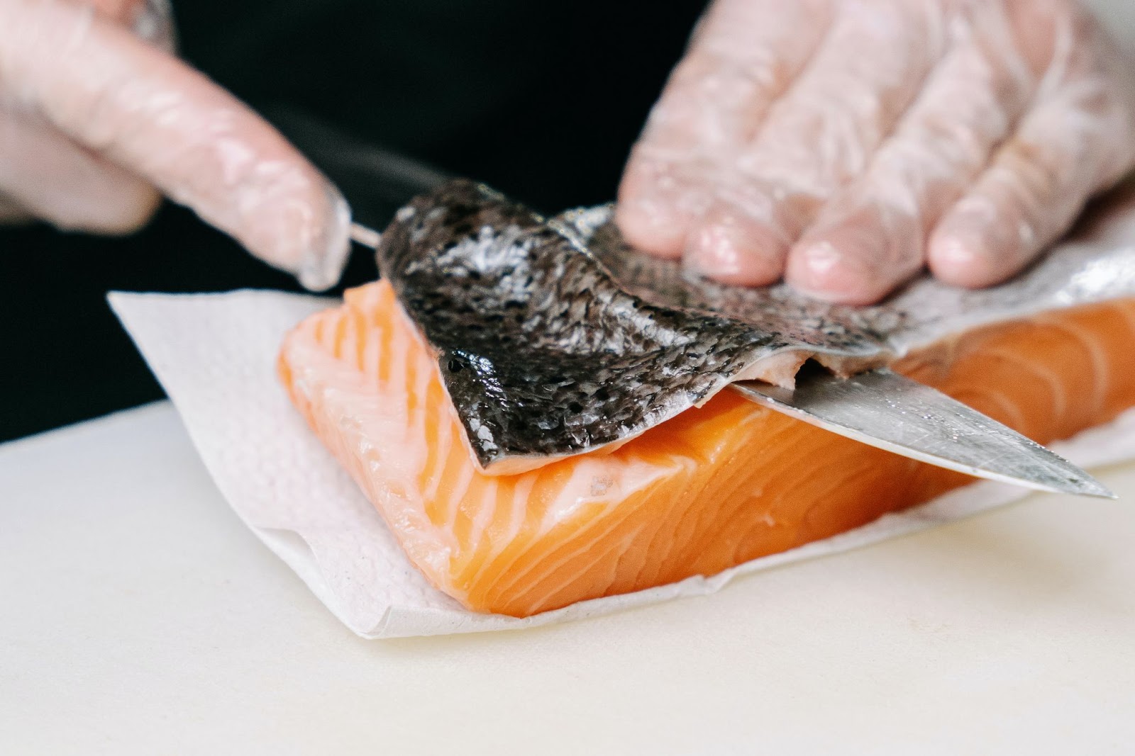 removing skin from salmon fillet