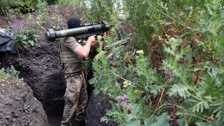 A Ukrainian serviceman mans a position in a trench on the front line near Avdiivka, Donetsk region on June 18, 2022 amid the Russian invasion of Ukraine.