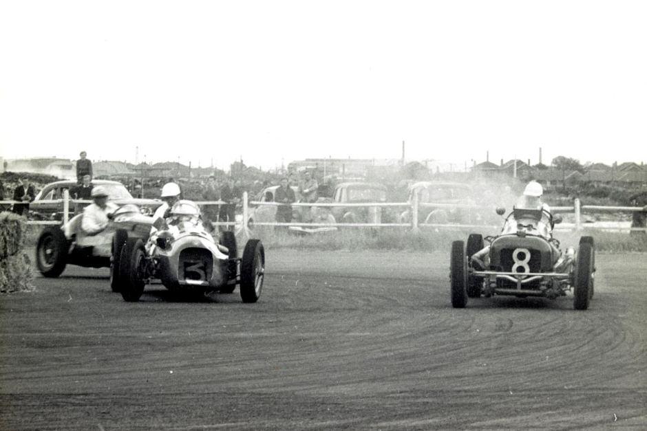 C:\Users\Valerio\Desktop\Jack Brabham (back), in a Cooper Bristol, races against LtoR Lex Davison in a H W M Jaguar and Ted Gray in an Alta Ford race for the Victoria Trophy at Fisherman's Bend, Victoria, on March 22, 1954..jpg
