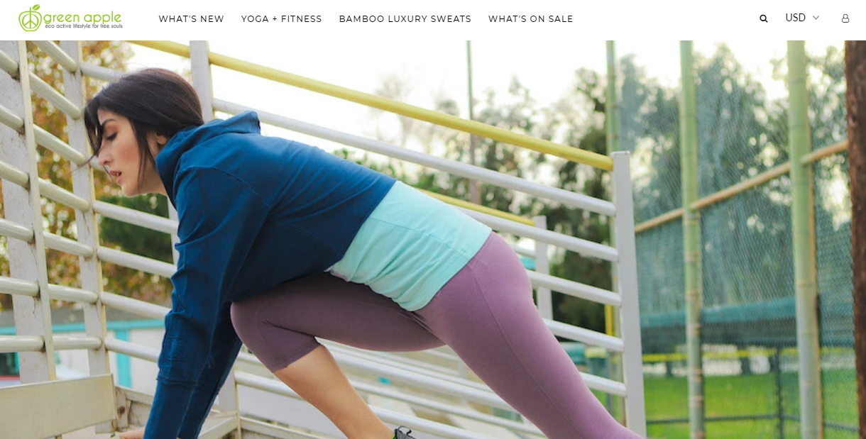 website home page with woman wearing workout outfit and stretching