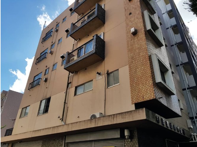 Anime Vs Real-life: Visiting Real-life location of One Punch Man - Saitama's Apartment side view in real life