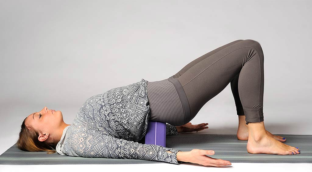     4. Supported Bridge Pose: Sequence of Restorative Yoga for Hip and Back Pain     