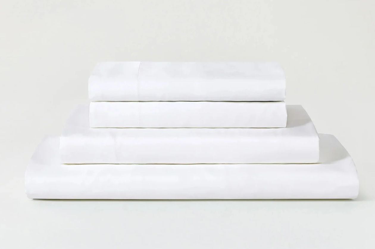 Stack of white folded sheets