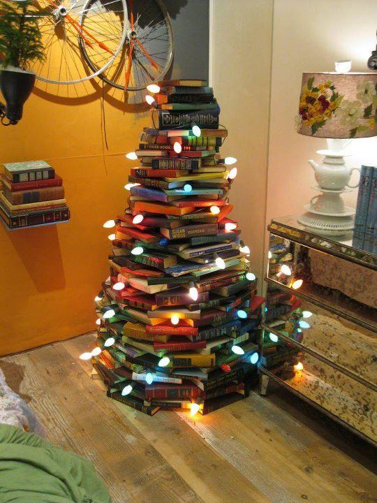 Sustainable, eco-friendly Christmas tree alternative made from stacked books and string lights