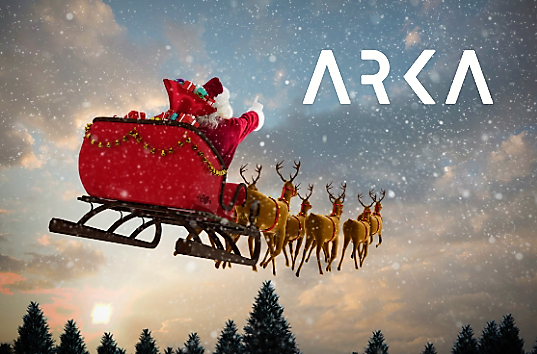 Santa in the sky with his reindeer and white arka logo
