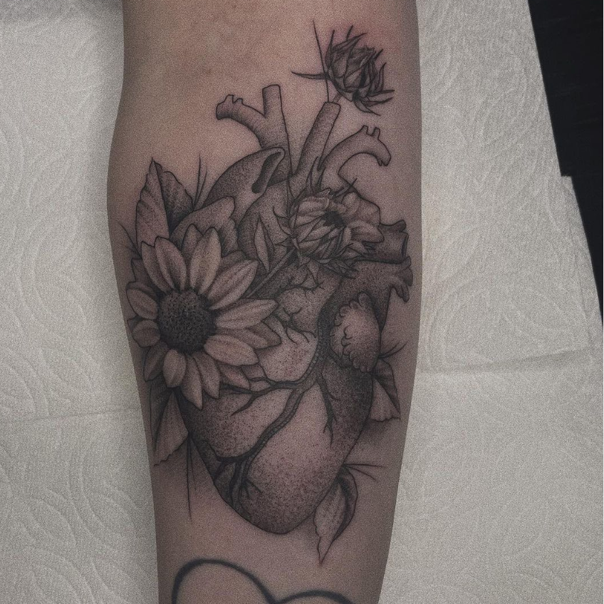 Lily Blooming Anatomical Heart Tattoos