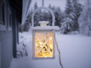 White lantern as front yard decor during winter home selling