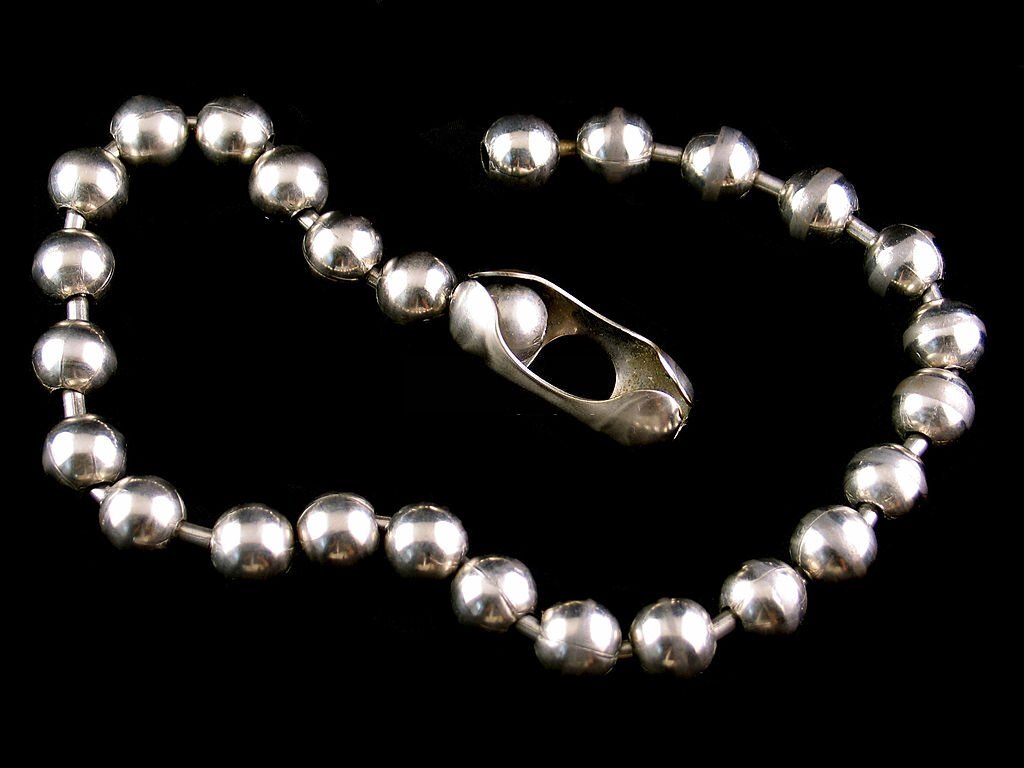 Silver bracelet with pearl like balls
