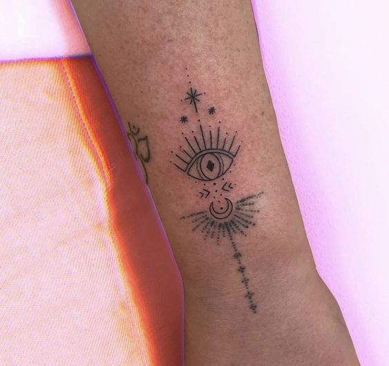 Another look at the small and petite evil eye tat