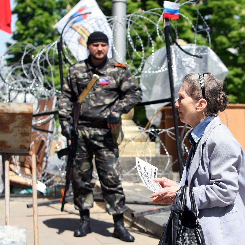 The fake referendum in Donbas was conducted at a gunpoint. Photo: dn.depo.ua ~