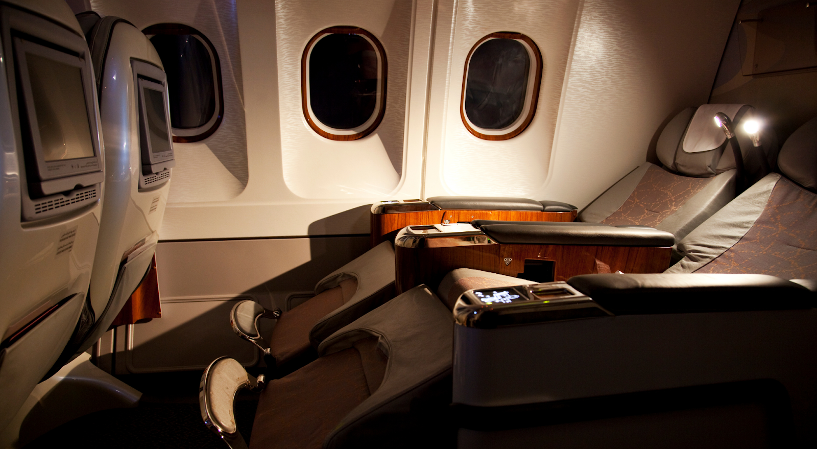 seats reclined in business class on overnight flight