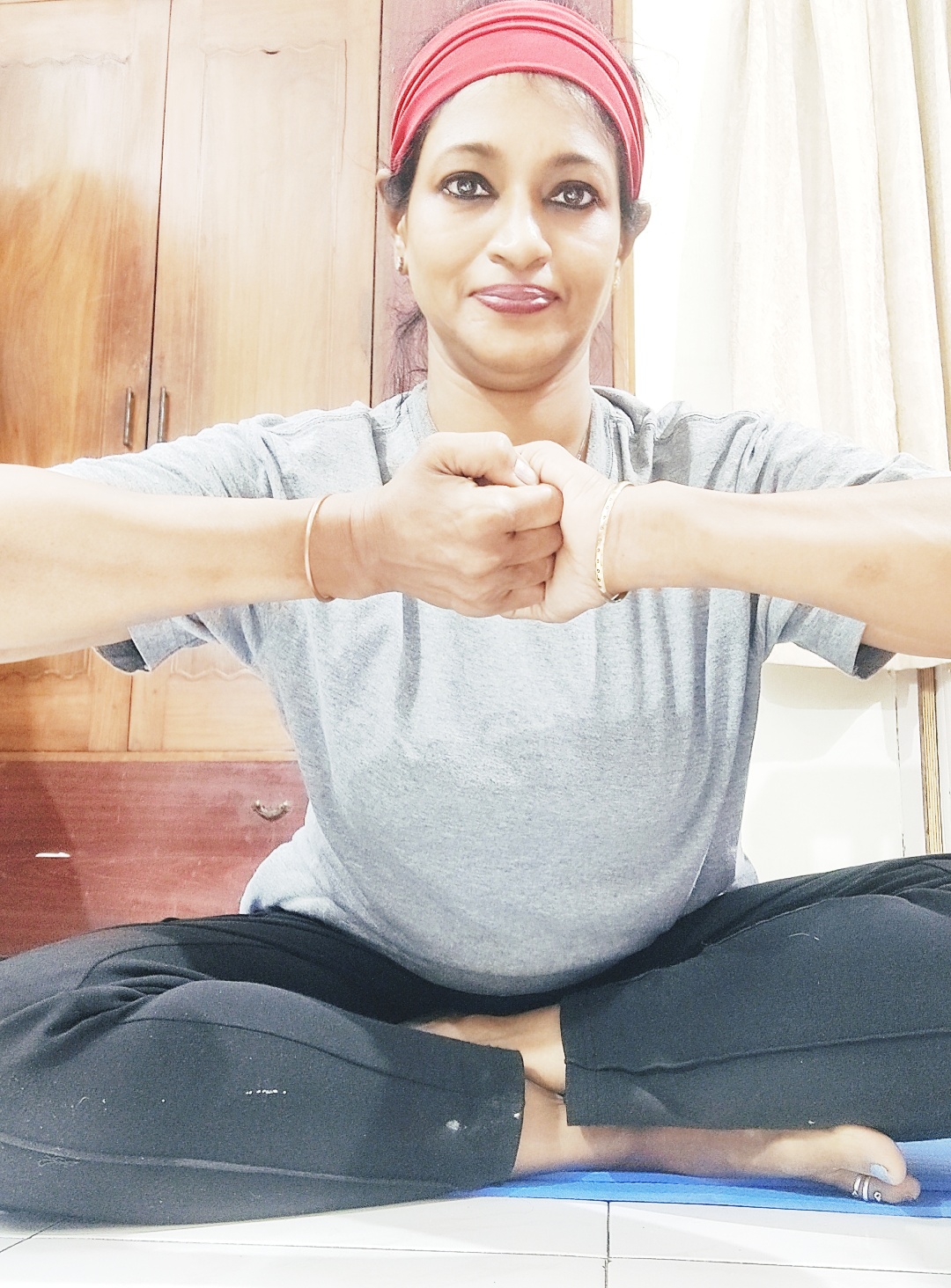Another one of the top mudras for seniors, the Ganesha mudra stretches and strengthens the muscles of the neck, shoulders, and abdominals and excellent for those with acute spondylitis 
