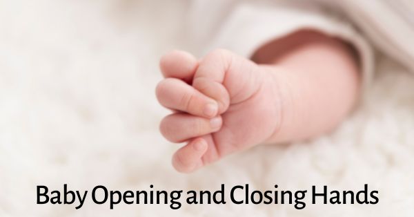 baby opening and closing hands