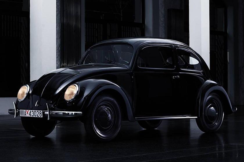 A black car parked in front of a building

Description automatically generated with medium confidence