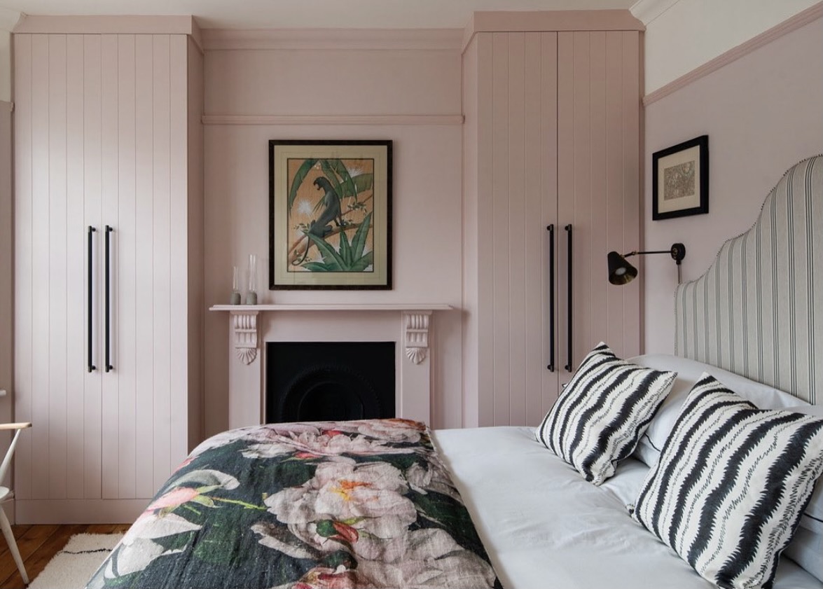 Modern bedroom with Calamine Pink walls by Farrow and Ball