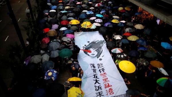 北京“三不要”网文真伪难辨 港人继续“和理非”抗争