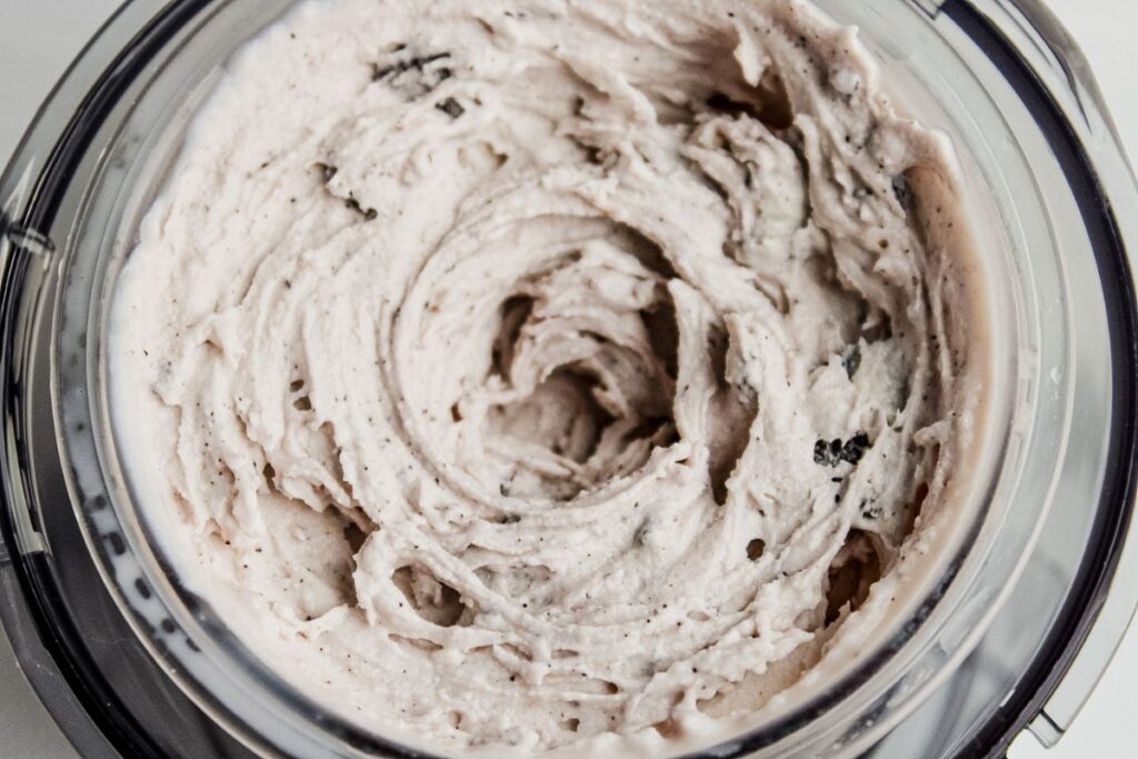A close-up shot of cookies and cream ice cream made in the ninja creami ice cream maker.