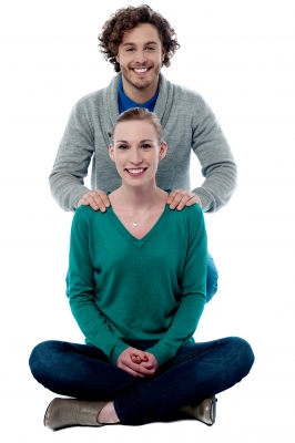 young man and young woman smiling