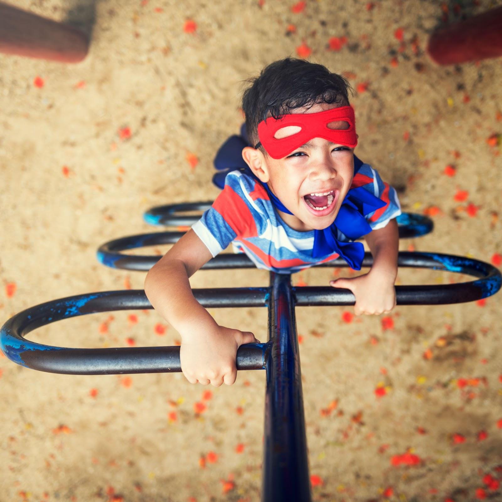 Child playing on a climbing frame