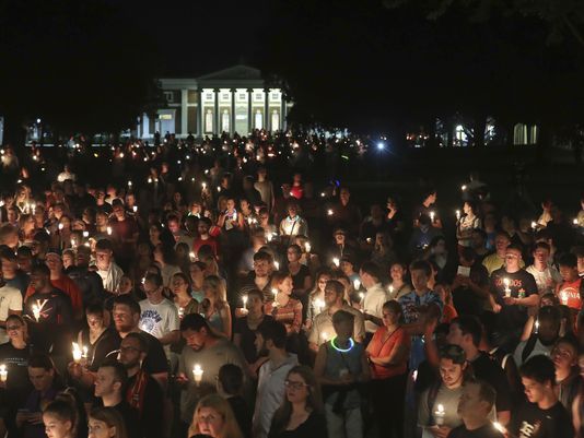 AP APTOPIX CONFEDERATE MONUMENT PROTEST CAMPUS MARCH A USA VA