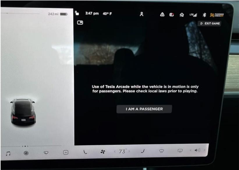 Drivers can now play video games in a moving Tesla, raising safety concerns 2