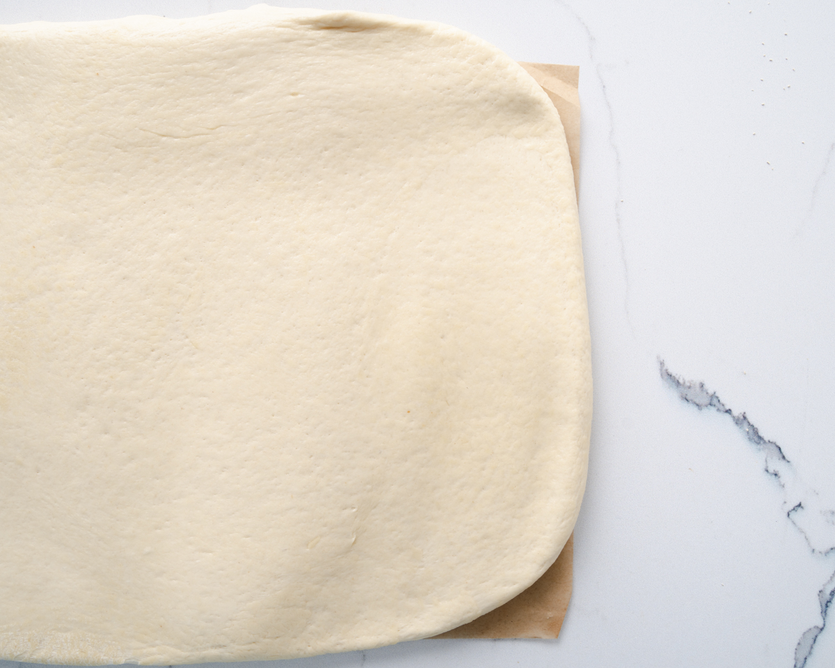 rolled out dough on baking sheet