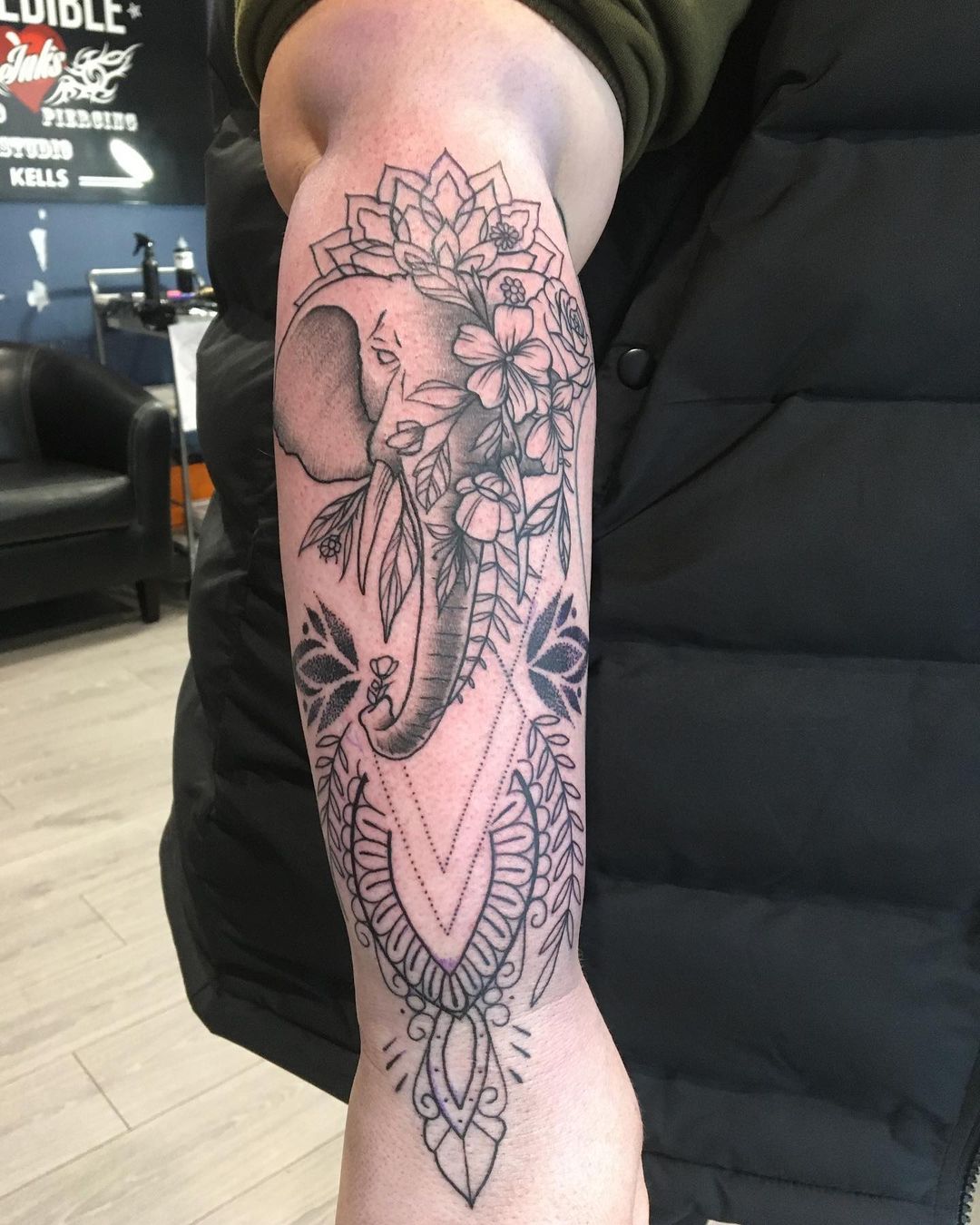 Outlined Flower & Elephant Tattoo