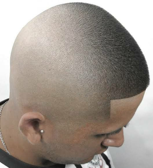 a guy with perced ear wearing a southsie fade