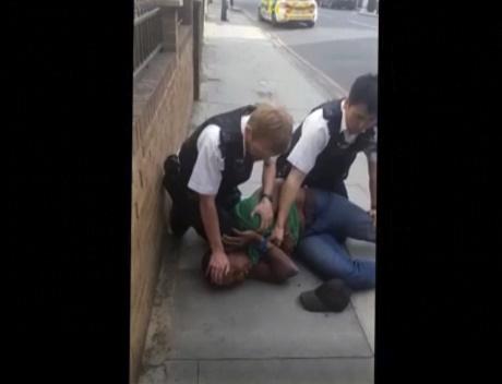 Video of Black man's arrest puts London police in spotlight | AP News