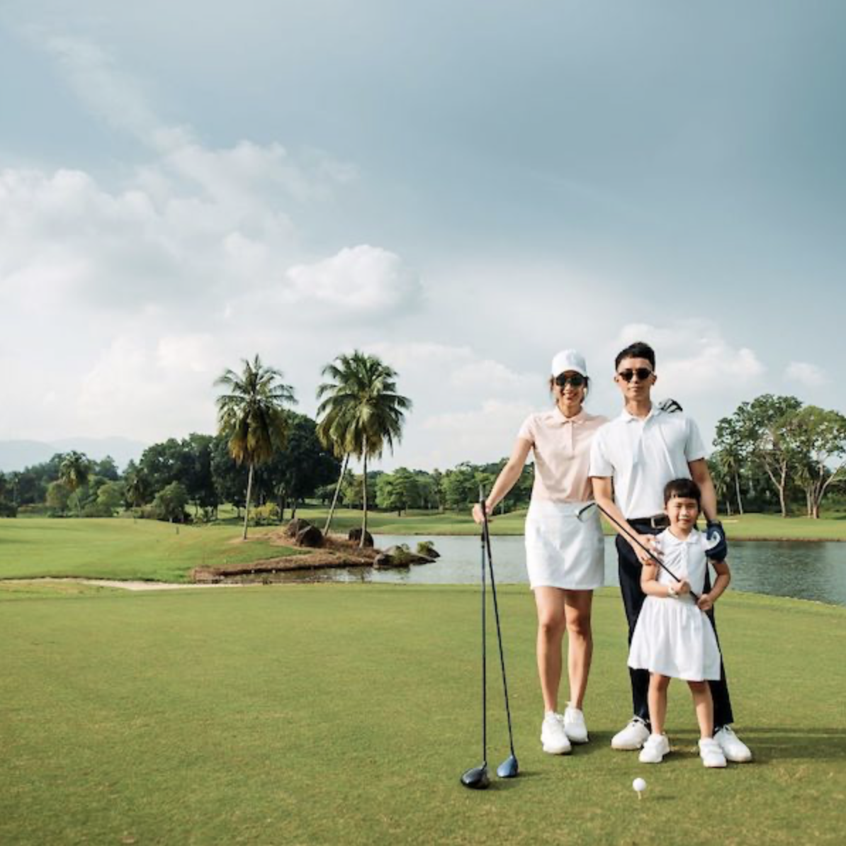 family golfing