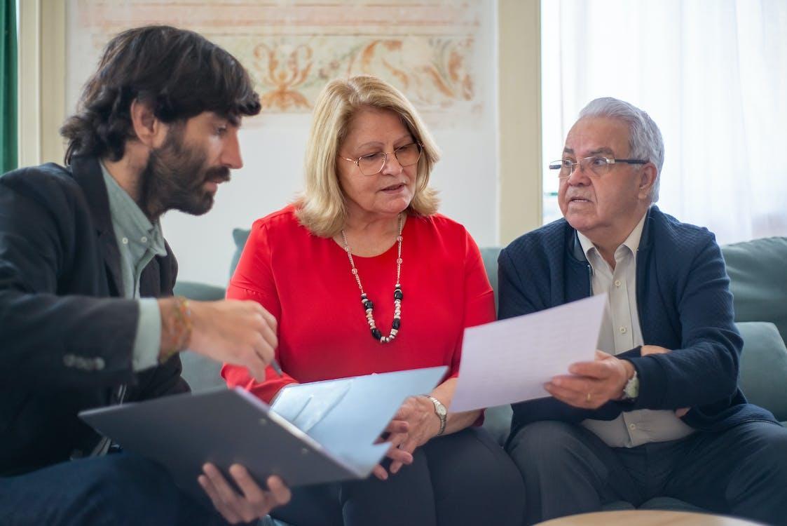 Free A Man Talking to the Elderly Couple Stock Photo