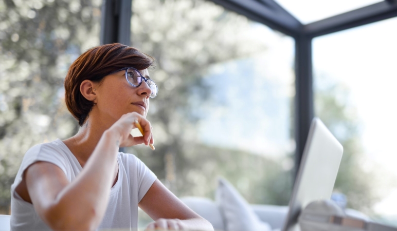 woman thinking before making a big decision