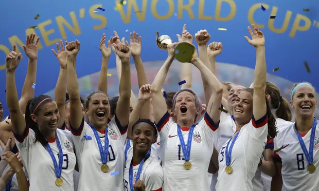USA still world leaders in women’s football despite England closing gap: The words "European v world champions" appear over the screen