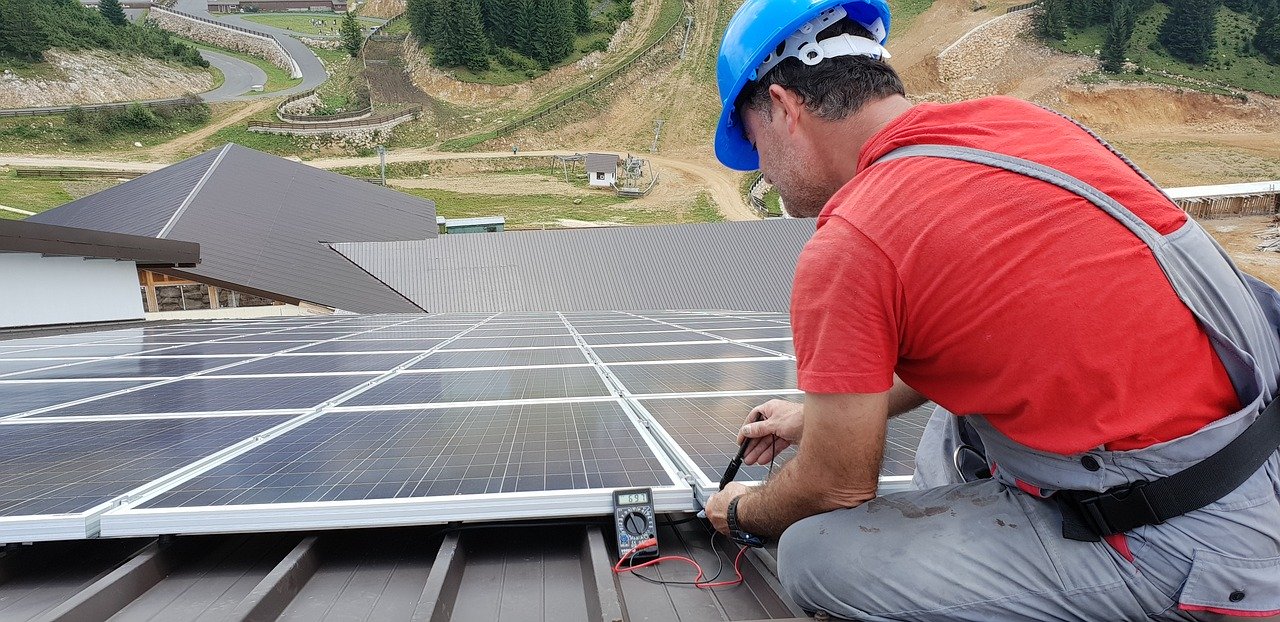 photos/technician-solar-panel-renewable-3936985/